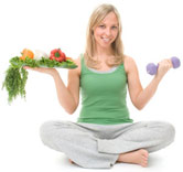 Lady with health diet and dumb bells:  The basis of lowering cholesterol